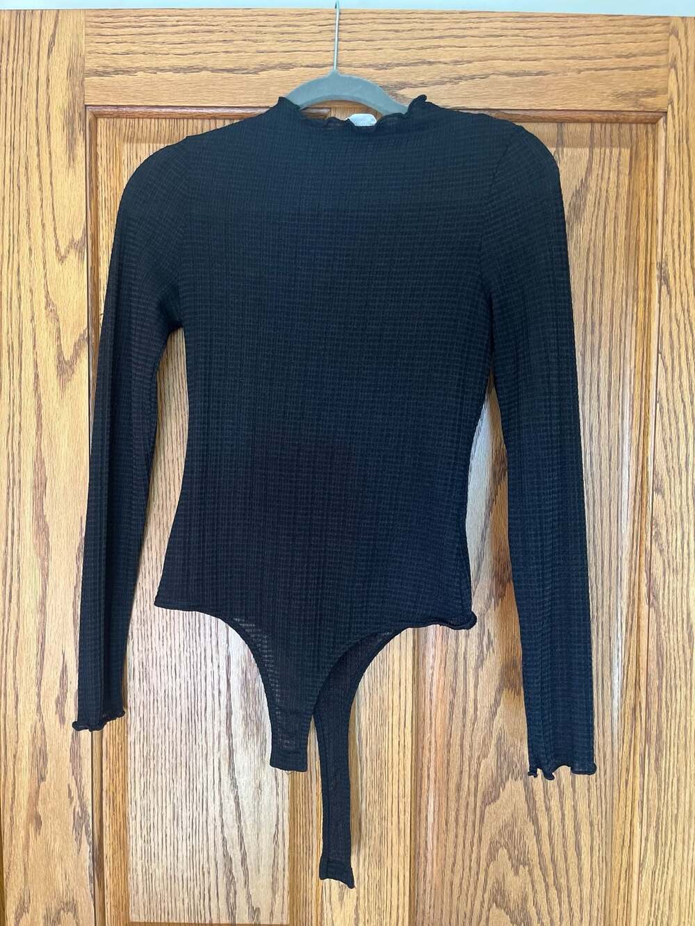 Le Lis Collection Black Ribbed Long Sleeve Mock Neck Lettuce Trim Bodysuit
